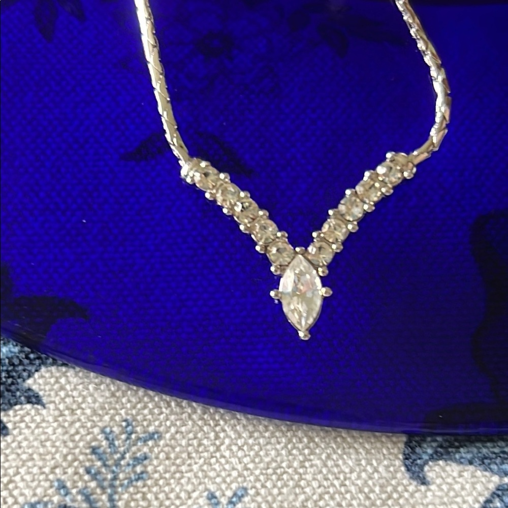 Christian Dior Rhodium necklace with pave Austrian crystals.